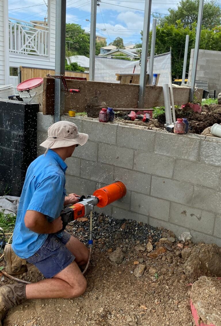 Plumbing installation work using a hole saw