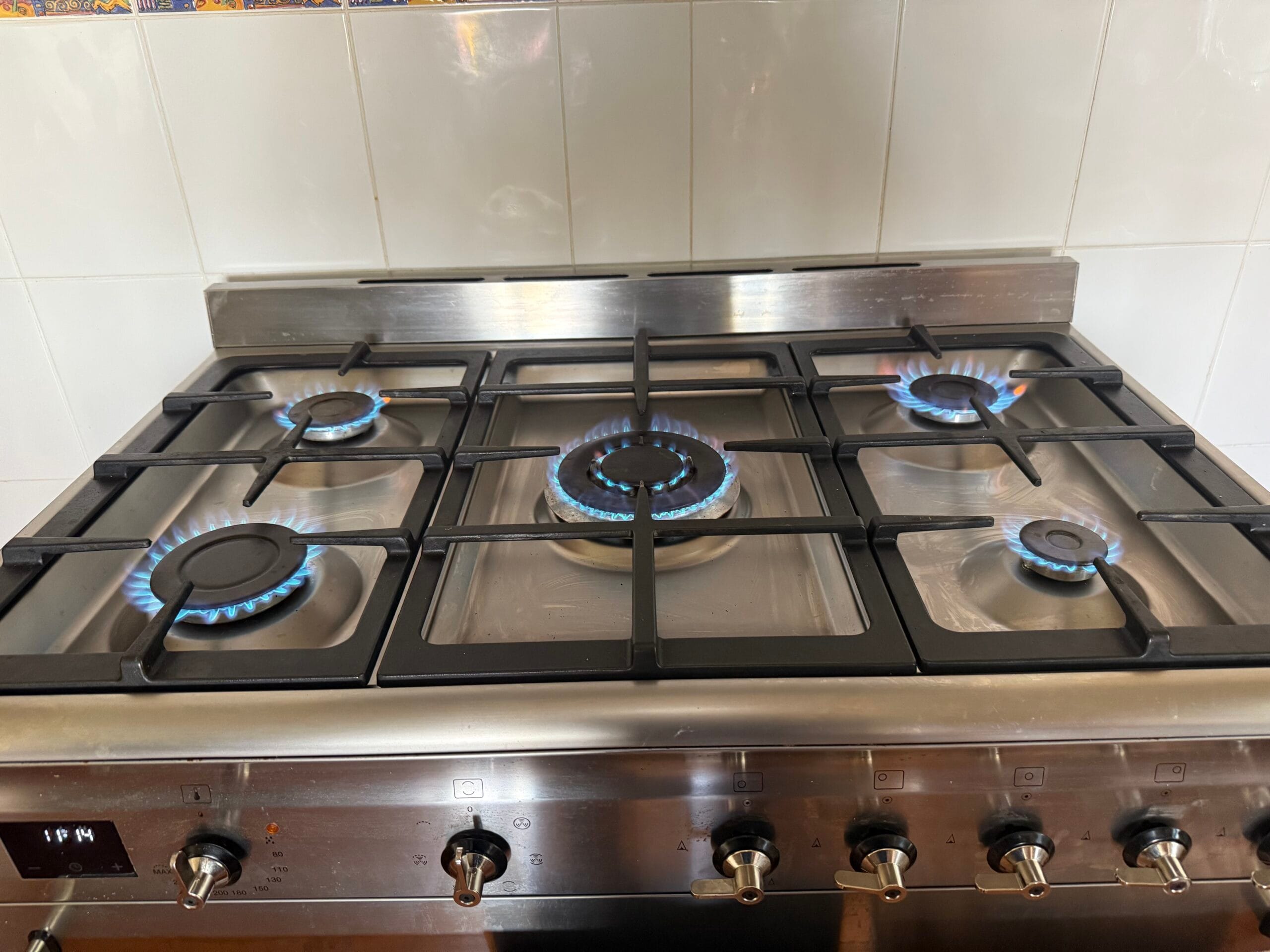Gas cooktop burners operating during testing and commissioning